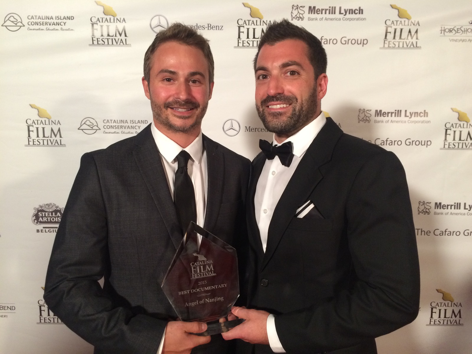 Frank Ferendo holding the Catalina Film Festival Best Documentary award for Angel of Nanjing